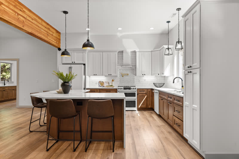 Modernized kitchen with white shaker cabinets and quartz island in Vancouver, Washington